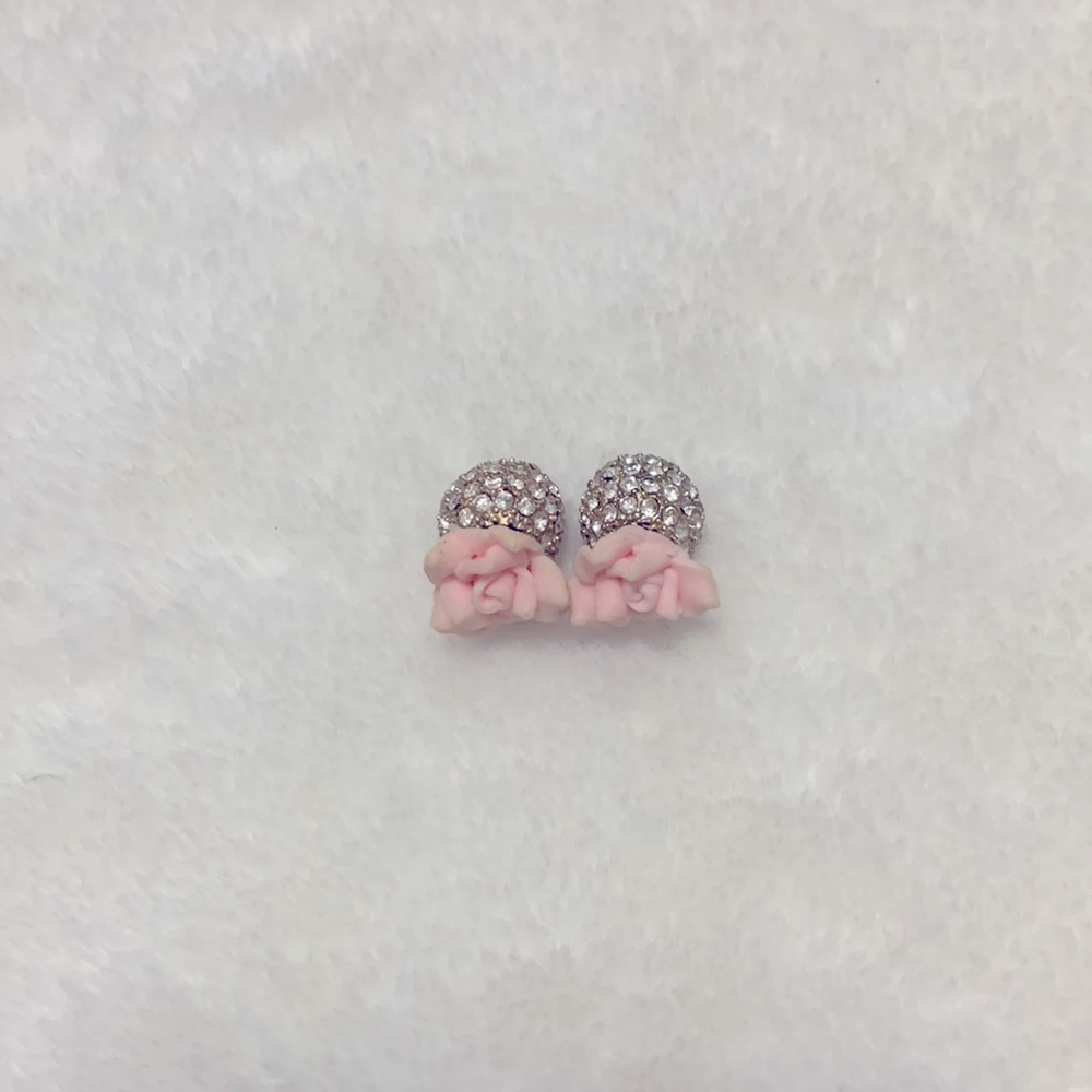 Cute earrings , roses and the back is a ball of stones.
